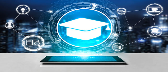 Distance Learning image with Graduation cap connected electronically to online tools