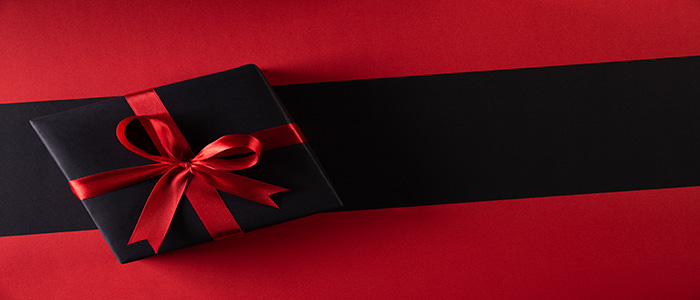 Black gift box with red ribbon