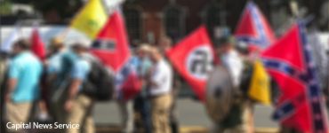 CHARLOTTESVILLE, Virginia - White nationalists march at a Unite the Right rally in 2017 that led to violence and the death of a young woman. (Anthony Crider/Flickr)