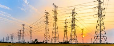 High-voltage,Power,Lines,At,Sunset,high,Voltage,Electric,Transmission,Tower